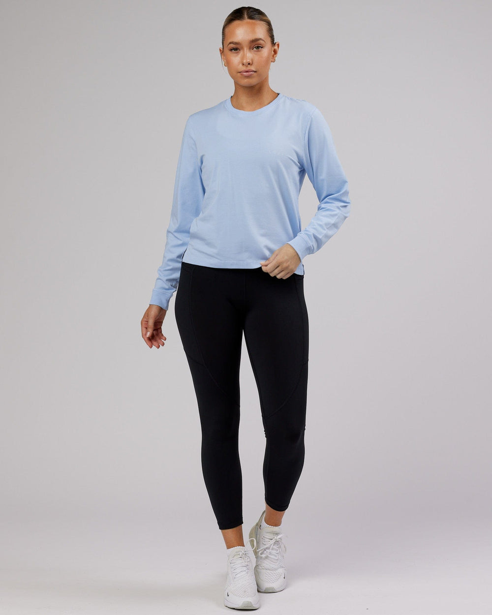 Woman wearing PimaFLX LS Tee - Windsurfer
