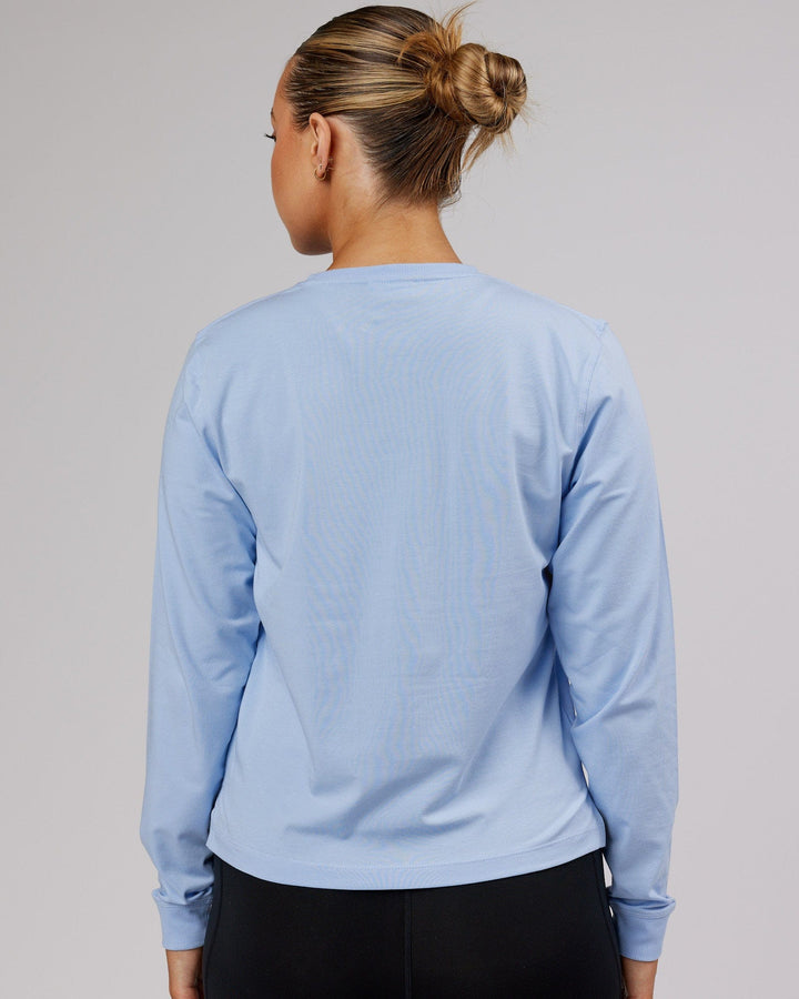 Woman wearing PimaFLX LS Tee - Windsurfer