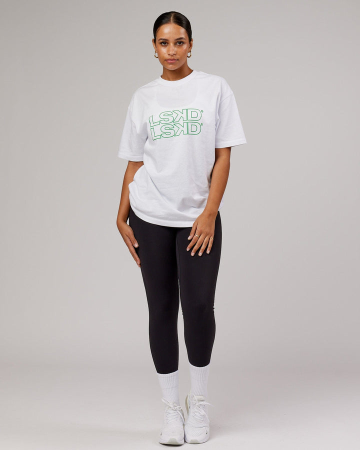 Woman wearing Unisex Stacks Up Heavyweight Tee - White-Vivid Green