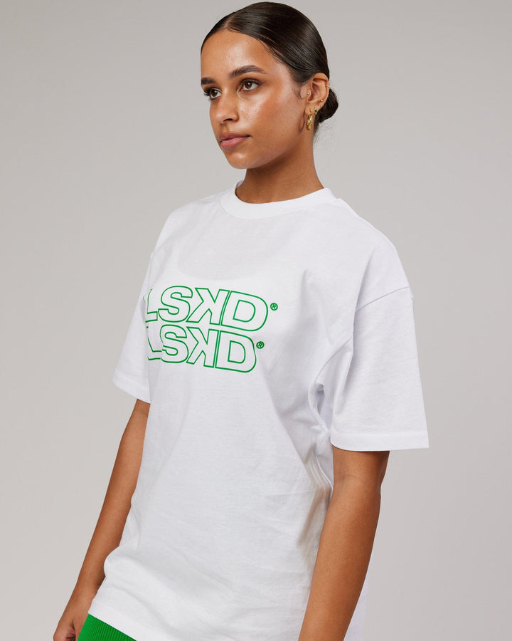 Woman wearing Unisex Stacks Up Heavyweight Tee - White-Vivid Green