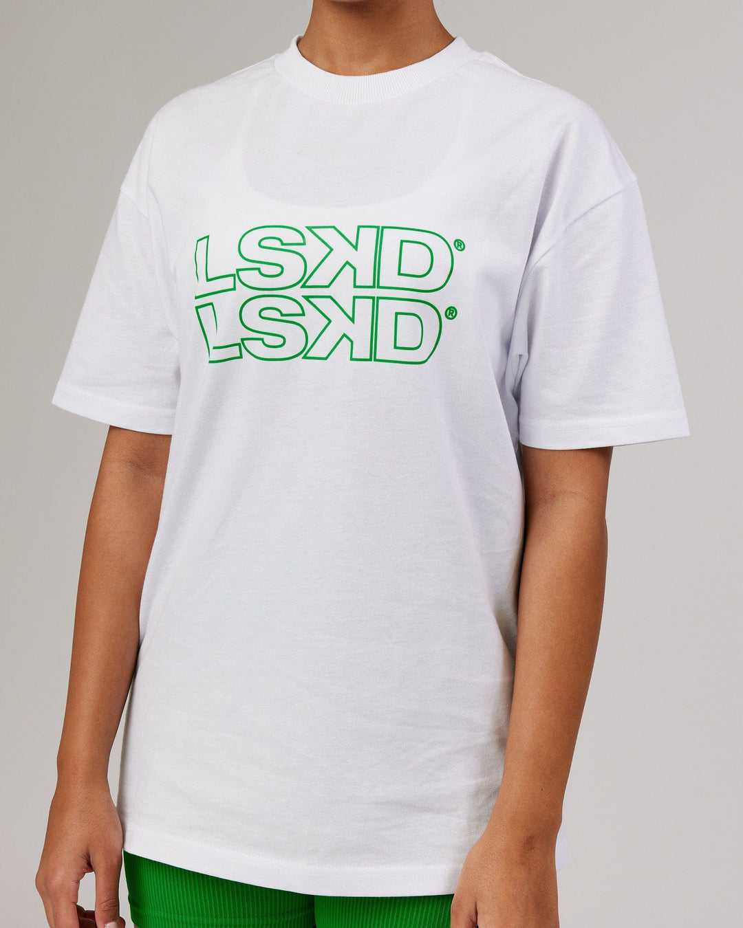 Woman wearing Unisex Stacks Up Heavyweight Tee - White-Vivid Green