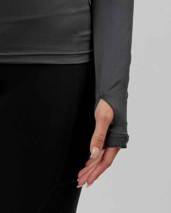 Woman wearing Streamlined 1/4 Active Long Sleeve Top - Asphalt