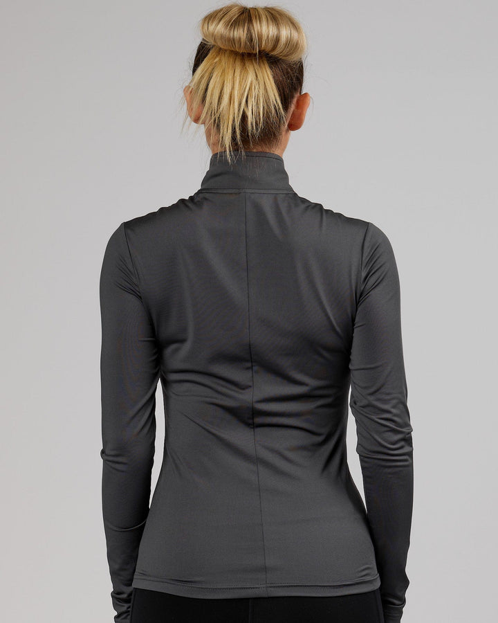 Woman wearing Streamlined 1/4 Active Long Sleeve Top - Asphalt