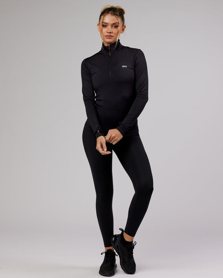 Woman wearing Streamlined 1/4 Active Long Sleeve Top - Black
