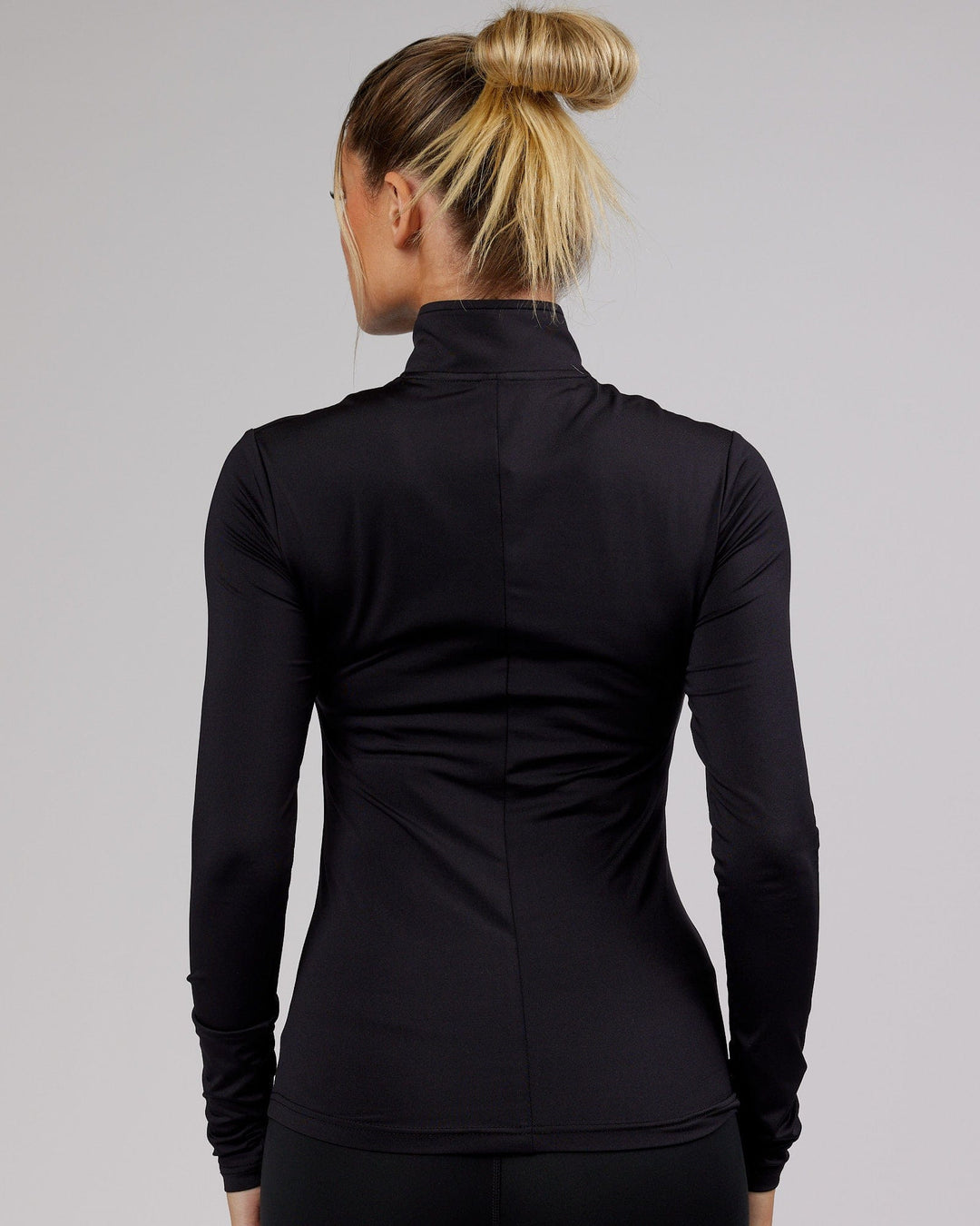 Woman wearing Streamlined 1/4 Active Long Sleeve Top - Black