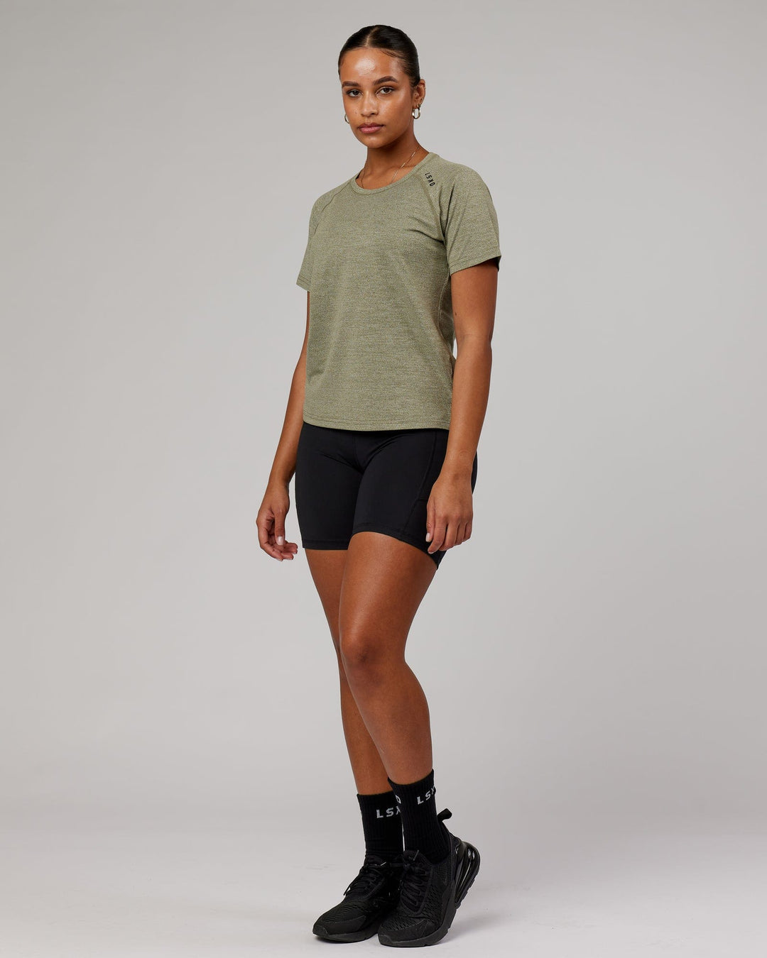 Woman wearing Olive Marl Perform VapourLFX 