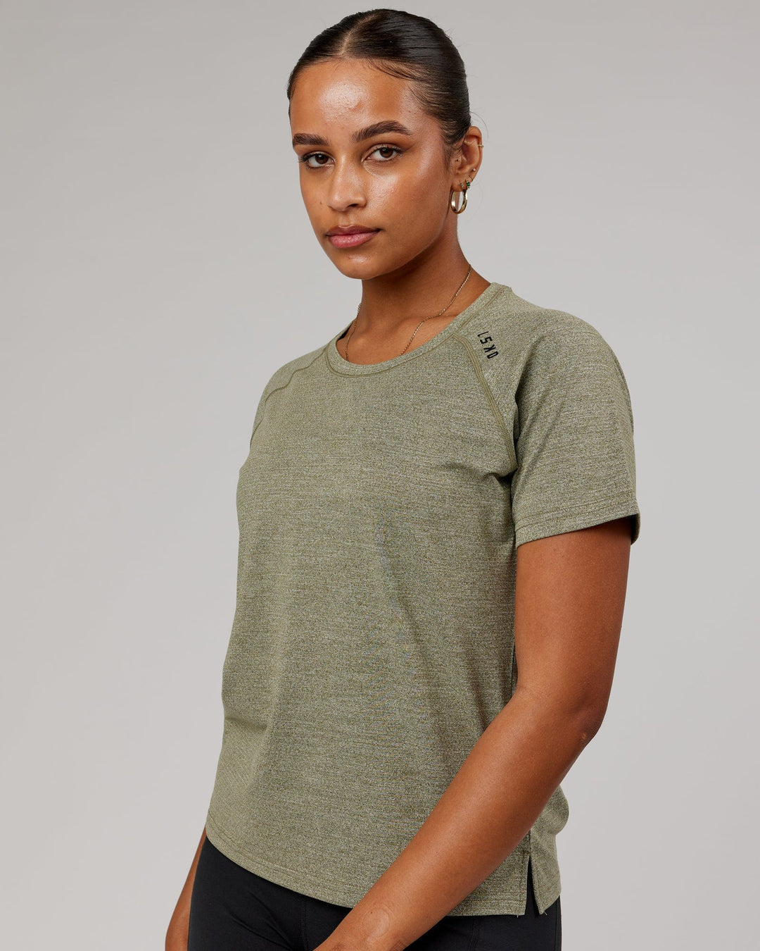 Woman wearing Olive Marl Perform VapourLFX 